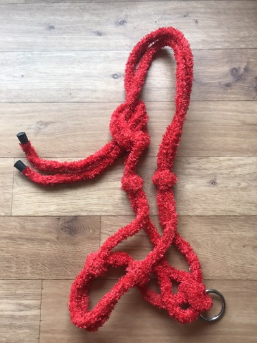 Red fuzzy furry knotted - furry,